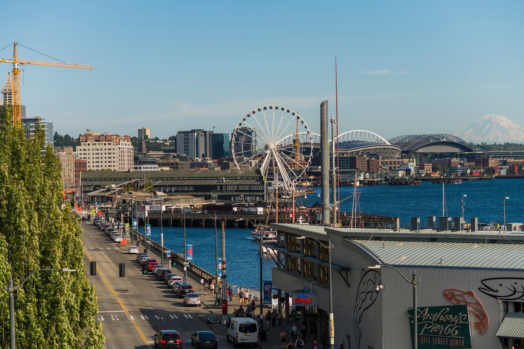 Seattle waterfront with the Great Wheel, piers and downtown buildings